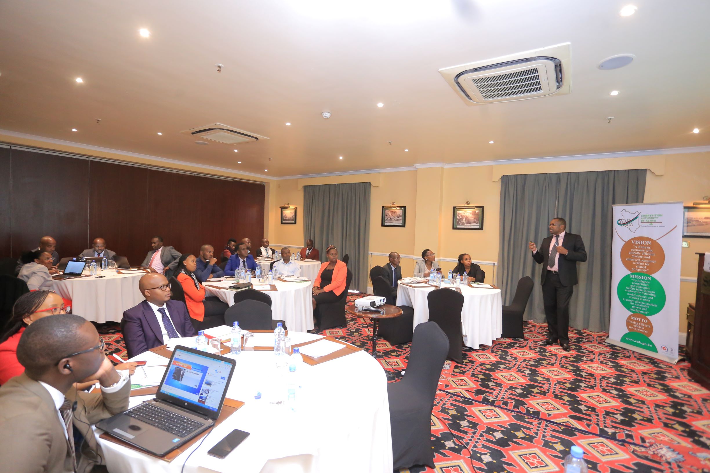 Mr. Gideon Mokaya, Manager Enforcement & Compliance, addressing delegates on a session to commemorate the World Competition Day 2019